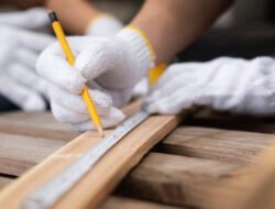 high-angle-hand-holding-crayon