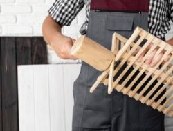 man-working-wood-object-with-close-up